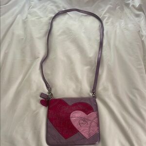 Coach cross body purple metallic purse